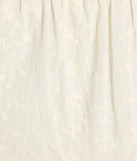 The Free Spirit High-Rise Embroidered Slit Maxi Skirt in beige brings edge and energy to your vibe, ready to elevate any festival look or concert outfit.