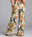 Complete your summer wardrobe with the Sunny Escape Tropical Print Palazzo Pants, trendy pants in multi-color made to mix, match, and stand out.