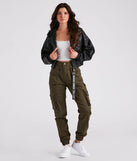 The Major Cutie Cargo Joggers is a trendy women's bottom in olive green, designed with modern details and alluring textures to complete chic outfits for 2025.