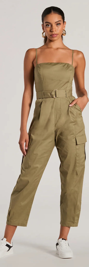Combining rugged charm with practical details, the Social Outing Sleeveless Belted Cargo Crop Jumpsuit is a utility-style olive one-piece ideal for creating a bold holiday party outfit, casual NYE look, or versatile winter outfit.