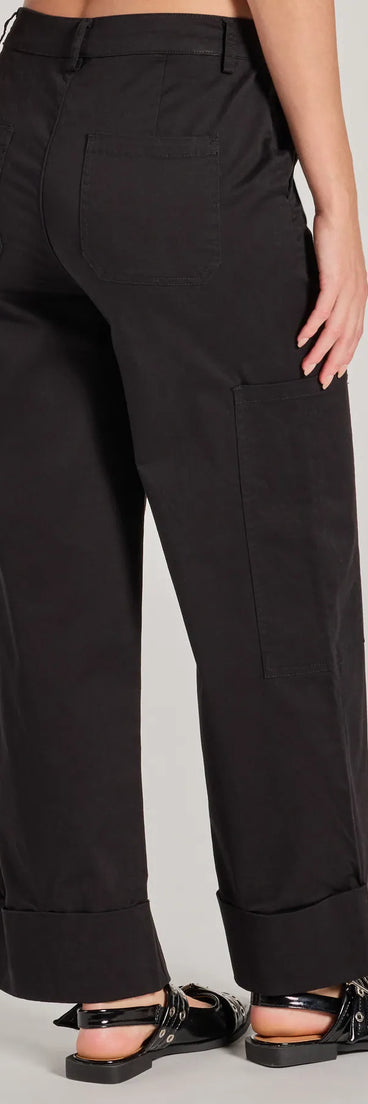 The Weekend Trip High-Rise Cuffed Cargo Pants is a trendy women's bottom in black, designed with modern details and alluring textures to complete chic outfits for 2025.