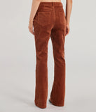 The Retro Chic Corduroy High-Rise Flare Pants is a trendy women's bottom in rust, designed with modern details and alluring textures to complete chic outfits for 2025.