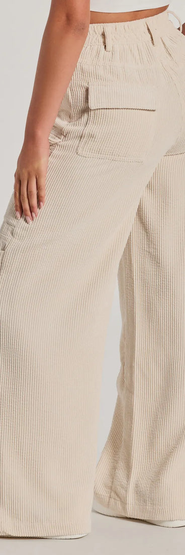 The Essential High-Rise Corduroy Wide-Leg Cargo Pants is a trendy women's bottom in ivory, designed with modern details and alluring textures to complete chic outfits for 2025.