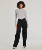 The The Next Level High-Rise Cargo Pants is a trendy women's bottom in black, designed with modern details and alluring textures to complete chic outfits for 2025.