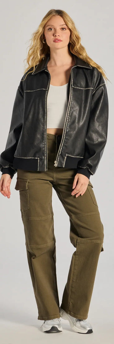 The The Next Level High-Rise Cargo Pants is a trendy women's bottom in olive green, designed with modern details and alluring textures to complete chic outfits for 2025.