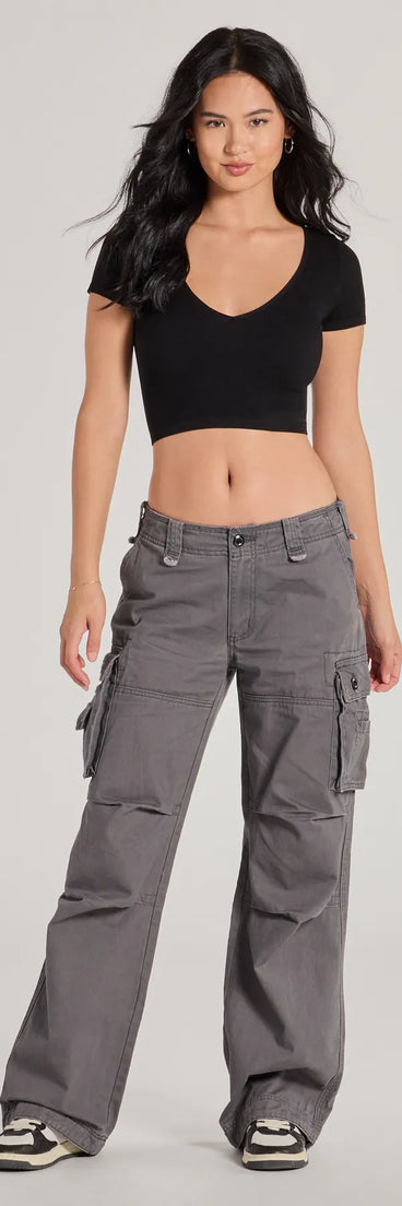 A stylish choice for adding an edgy flair to your everyday attire, the Step It Up Mid-Rise Twill Cargo Pants in charcoal are utility-inspired cargos for women that create a bold yet functional on-trend outfit.