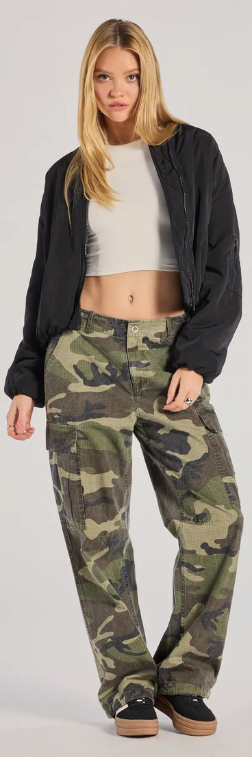 A stylish choice for adding an edgy flair to your everyday attire, the Cool Girl Energy Camo Cargo Pants in olive are utility-inspired cargos for women that create a bold yet functional on-trend outfit.