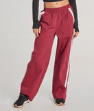 The Star Of The Track High-Rise Striped Track Pants is a trendy women's bottom in burgundy, designed with modern details and alluring textures to complete chic outfits for 2025.