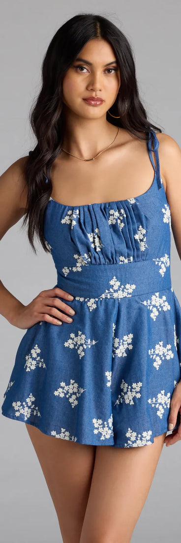 With its easy fit and flirty cut, the Effortless Summer Cutie Chambray Floral Romper is a denim blue one-piece that brings fun, freedom, and movement to your weekend look.