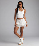 Choosing the off-white skort says you’re ready to show off in the Lookin' Cutesy Floral Ruffled Mini Skort, a warm-weather staple that elevates your outfit and seasonal style.