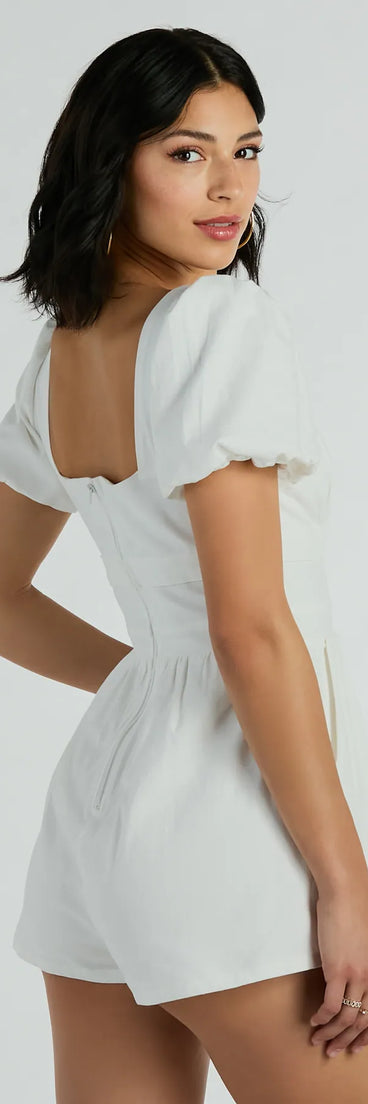 The One Take Puff Sleeve V-Neck Linen Romper is an elevated one-piece that blends sleek sophistication with playful charm, perfect for nailing casual or formal outfits.