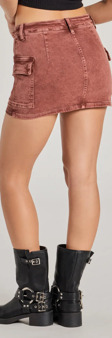 The Raise the Bar Mid-Rise Cargo Skort is a trendy women's bottom in rust, designed with modern details and alluring textures to complete chic outfits for 2025.