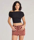 The Raise the Bar Mid-Rise Cargo Skort is a trendy women's bottom in rust, designed with modern details and alluring textures to complete chic outfits for 2025.