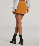 The Trendy Girl Corduroy Faux Wrap Mini Skort is a trendy women's bottom in mustard yellow, designed with modern details and alluring textures to complete chic outfits for 2025.