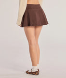 With a flirty cut and hidden shorts underneath, the Looking Cool Belted And Pleated Mini Skort in ivory serves skirt vibes with zero wardrobe worries.
