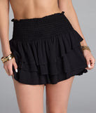 The Cutesy Fave Smocked And Ruffled Shorts in black brings edge and energy to your vibe, ready to elevate any festival look or concert outfit.