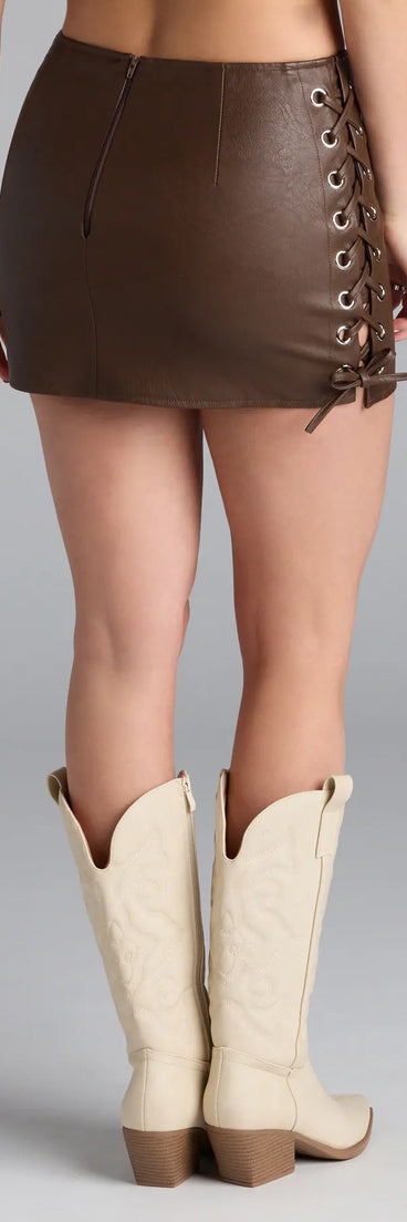 A chic brown faux leather skirt, like the Life Of The Party Lace-Up Mini Skirt, brings sleek texture and versatile edge to casual or night-out outfits.