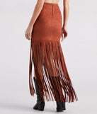 The Wild At Heart Long Fringe Skirt in tan brings edge and energy to your vibe, ready to elevate any festival look or concert outfit.