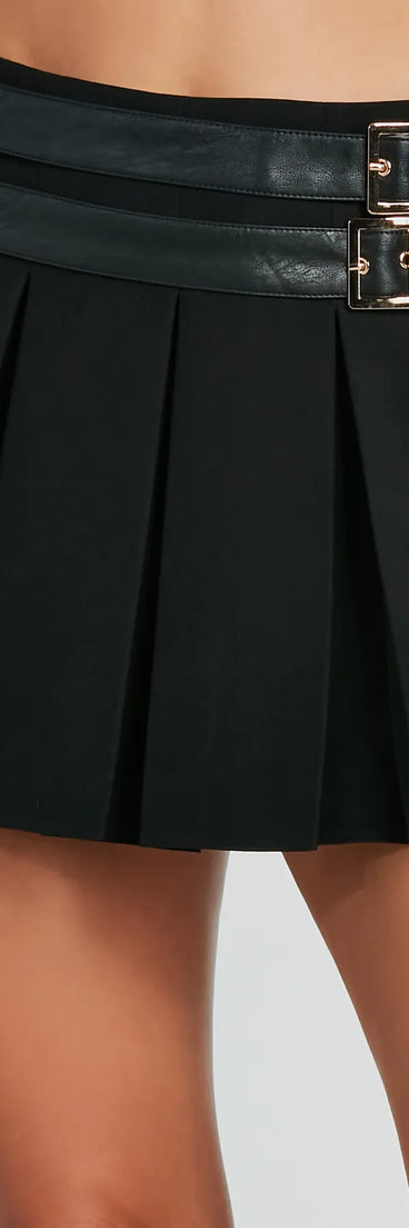 The Play Time Double Belt Woven Mini Skirt in black is a women's workwear essential with an elevated fabric and chic silhouette, ideal for layering and versatile enough to take your look from office chic to going-out ready!