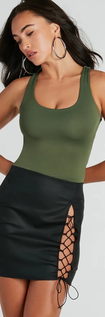 The Babe Alert Lace-Up Woven Mini Skirt is a trendy women's bottom in black, designed with modern details and alluring textures to complete chic outfits for 2025.