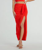 The Sunny Vibes High Slit Woven Midi Skirt is a trendy women's bottom in orange, designed with modern details and alluring textures to complete chic outfits for 2025.