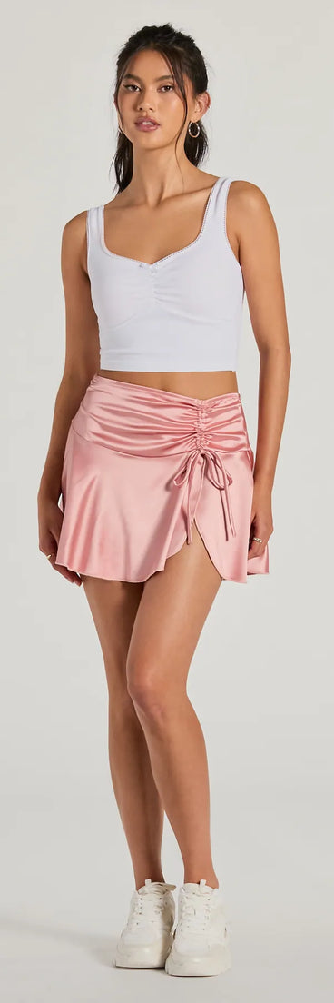 The Sweetest Ever Bow Detail Satin Mini Skirt in pink brings edge and energy to your vibe, ready to elevate any festival look or concert outfit.