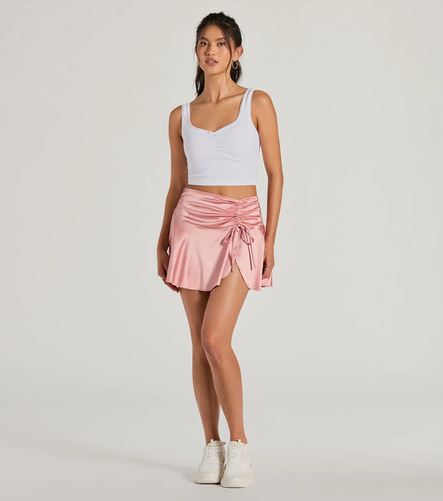 The Sweetest Ever Bow Detail Satin Mini Skirt in pink brings edge and energy to your vibe, ready to elevate any festival look or concert outfit.