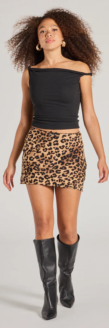 The Flirty Leopard Print Satin Mini Skirt is a trendy women's bottom in leopard print, designed with modern details and alluring textures to complete chic outfits for 2025.