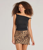 Create bold, fashion-forward looks for spring or summer with the Flirty Leopard Print Satin Mini Skirt in leopard print, a must-have piece from Windsor’s collection of stylish bottoms for women.