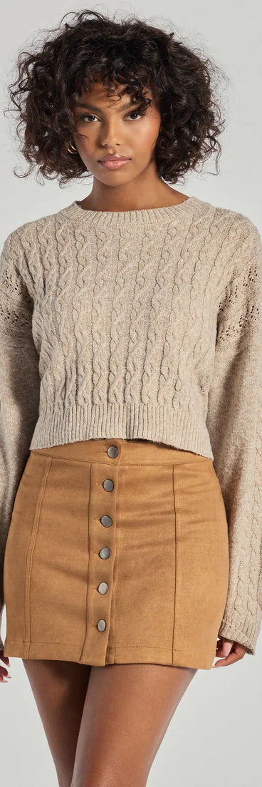 The Darling Details Button Down Faux Suede Mini Skirt in tan is a women's workwear essential with an elevated fabric and chic silhouette, ideal for layering and versatile enough to take your look from office chic to going-out ready!