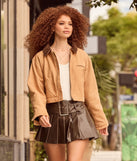 The City Chic Faux Leather Pleated Mini Skirt in brown is a women's workwear piece offering a trendy style and unique accents, perfect for effortlessly creating an outfit-of-the-day look that transitions your office look to going-out ready.