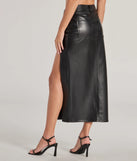 The Sleek Era Faux Leather High Slit Midi Skirt is a trendy women's bottom in black, designed with modern details and alluring textures to complete chic outfits for 2025.