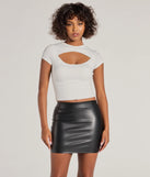 The Sultry Sleek Faux Leather Bodycon Mini Skirt in black brings edge and energy to your vibe, ready to elevate any festival look or concert outfit.
