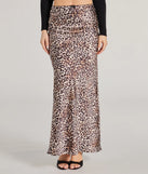 The It-Girl Chic Leopard Print Satin Maxi Skirt is a trendy women's bottom in leopard print, designed with modern details and alluring textures to complete chic outfits for 2025.