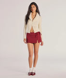 Create bold, fashion-forward looks for spring or summer with the Elevated Style Wrap Mini Skirt in red, a must-have piece from Windsor’s collection of stylish bottoms for women.
