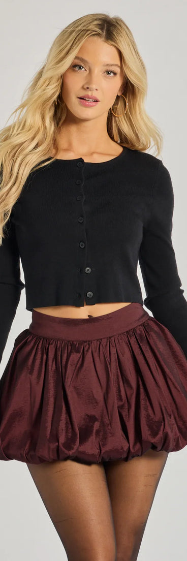 The Luxe Charm Taffeta Bubble Mini Skirt is a trendy women's bottom in burgundy, designed with modern details and alluring textures to complete chic outfits for 2025.