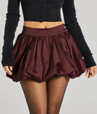 The Luxe Charm Taffeta Bubble Mini Skirt is a trendy women's bottom in burgundy, designed with modern details and alluring textures to complete chic outfits for 2025.