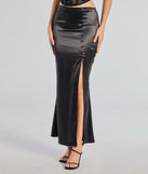 The Luxury Feels High-Rise Slit Satin Midi Skirt is a trendy women's bottom in black, designed with modern details and alluring textures to complete chic outfits for 2025.