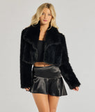 Create bold, fashion-forward looks for spring or summer with the Major Flirt Drop Waist Asymmetrical Mini Skirt in black, a must-have piece from Windsor’s collection of stylish bottoms for women.