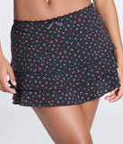 Create bold, fashion-forward looks for spring or summer with the Radiant Sweetie Floral Polka Dot Ruffle Skort in black, a must-have piece from Windsor’s collection of stylish bottoms for women.