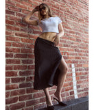 The There She Goes High-Rise Slit Polka Dot Satin Midi Skirt is a trendy women's bottom in black, designed with modern details and alluring textures to complete chic outfits for 2025.