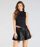 Create bold, fashion-forward looks for summer with the She's Irresistible Faux Leather A-Line Mini Skirt in black, a must-have piece from Windsor’s collection of stylish bottoms for women.