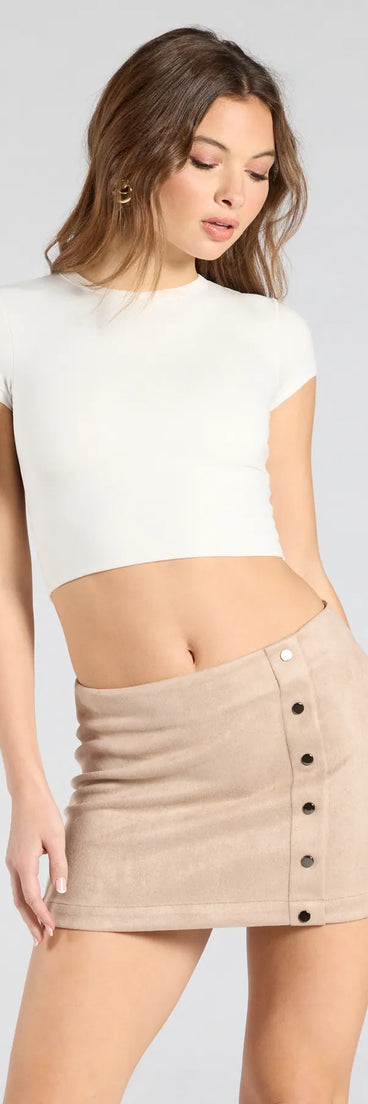 The Stylish Impression Faux Suede Mini Skirt in taupe features a short, flattering cut designed to elevate your look with just the right amount of edge.