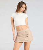 The Stylish Impression Faux Suede Mini Skirt in taupe features a short, flattering cut designed to elevate your look with just the right amount of edge.