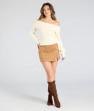 Create bold, fashion-forward looks for summer with the Keeping It Simple Faux Suede Slit Mini Skirt in tan, a must-have piece from Windsor’s collection of stylish bottoms for women.