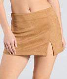 The Keeping It Simple Faux Suede Slit Mini Skirt is a trendy women's bottom in tan, designed with modern details and alluring textures to complete chic outfits for 2025.