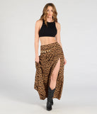 Create bold, fashion-forward looks for spring or summer with the On The Prowl High-Rise Slit Leopard Maxi Skirt in leopard print, a must-have piece from Windsor’s collection of stylish bottoms for women.