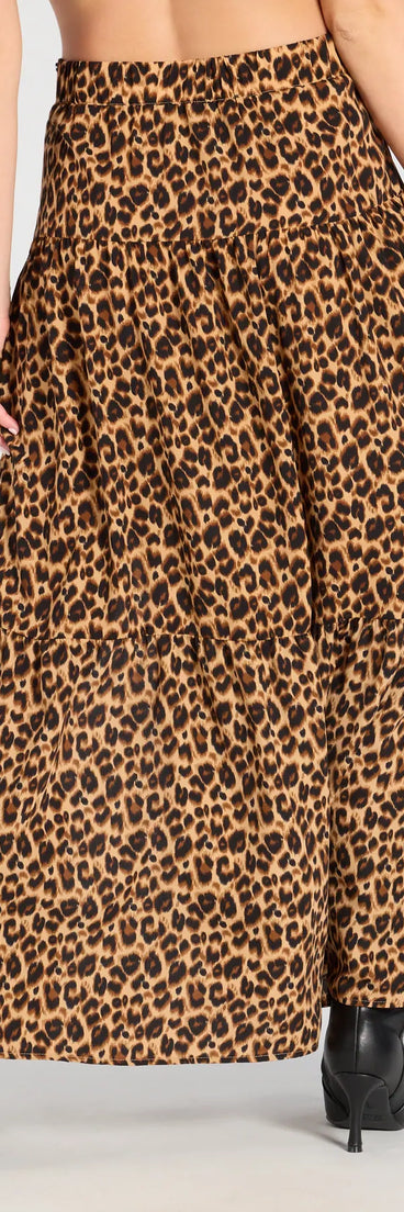 Create bold, fashion-forward looks for any happening this season with the On The Prowl High-Rise Slit Leopard Maxi Skirt in leopard print, a must-have piece from Windsor’s collection of stylish bottoms for women.