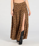 Create bold, fashion-forward looks for spring or summer with the On The Prowl High-Rise Slit Leopard Maxi Skirt in leopard print, a must-have piece from Windsor’s collection of stylish bottoms for women.