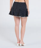 The Delightful Duo Polka Dot Ruffle Skirt in black features a short, flattering cut designed to elevate your look with just the right amount of edge.